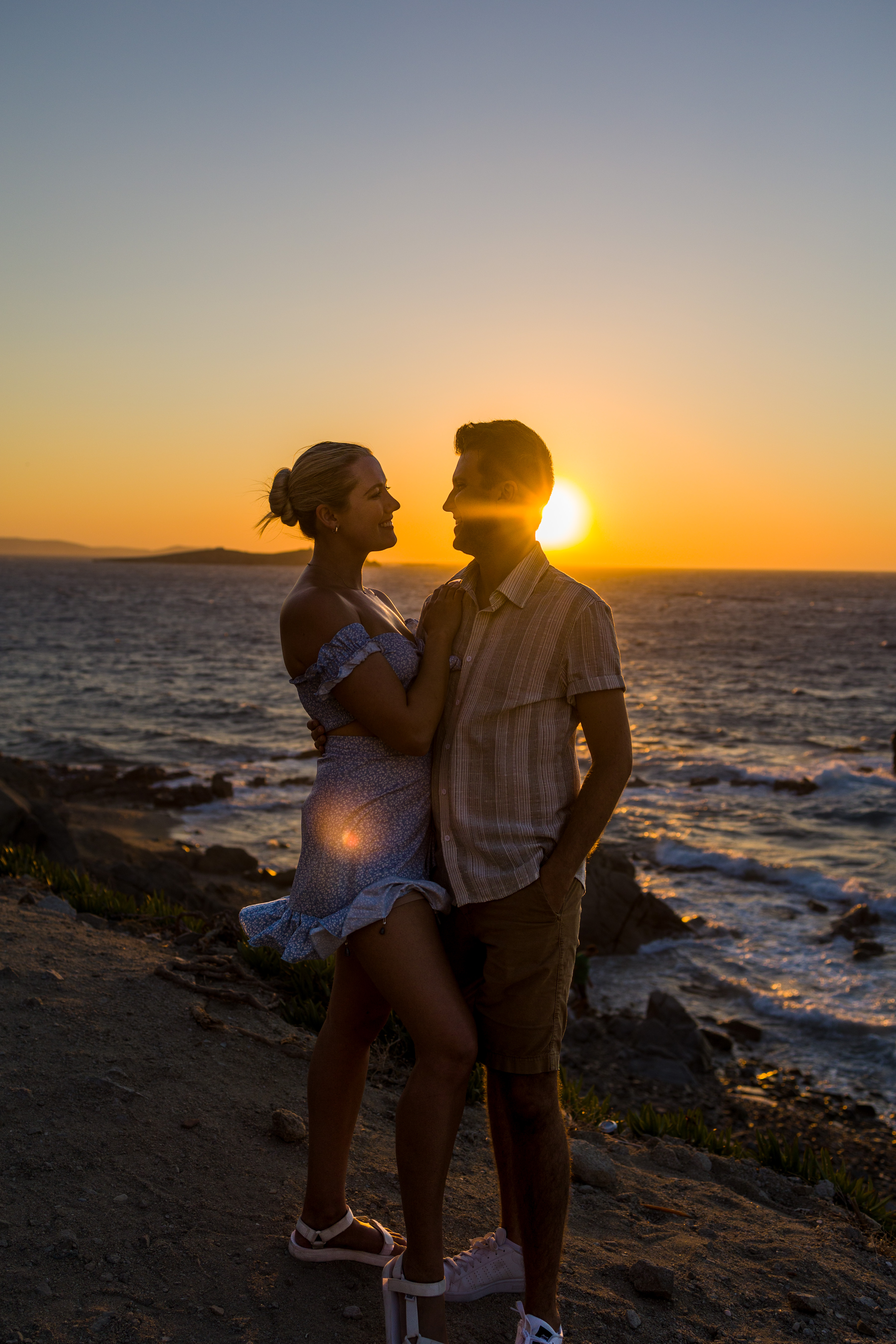 Couple posing at sunset in Mykonos